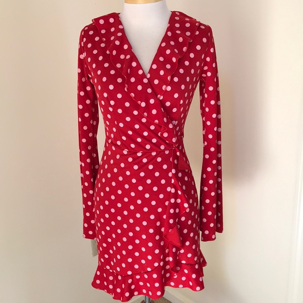 Pretty little thing SZ 6, red polka dotted faux wrap ruffled dress.